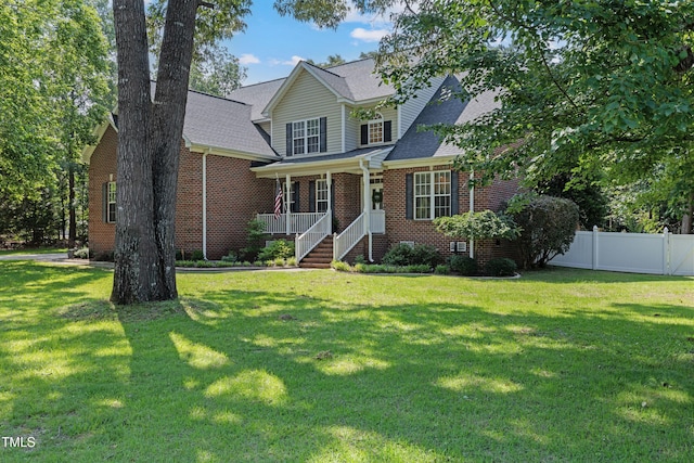 102 Sevendales Dr, Goldsboro, NC 27534 - view of front of property with brick siding, a porch, and a shingled roof