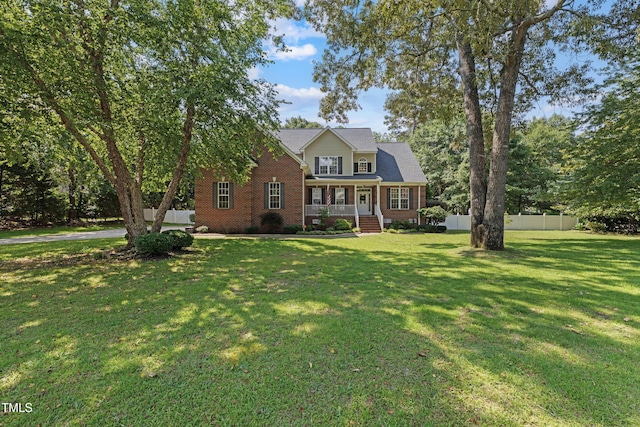 102 Sevendales Dr, Goldsboro, NC 27534 - traditional-style house with a porch and brick siding