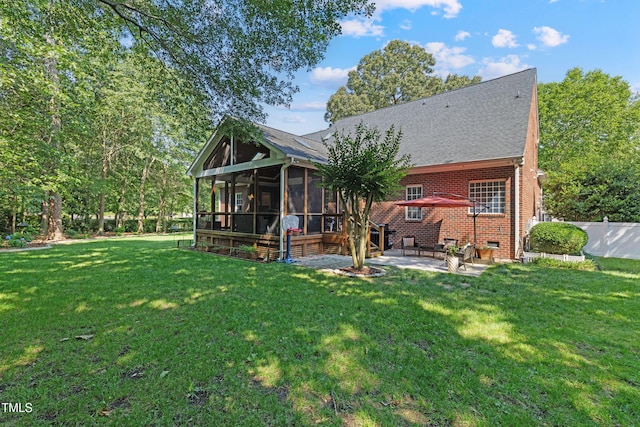 102 Sevendales Dr, Goldsboro, NC 27534 - back of property featuring a sunroom, a patio, and brick siding