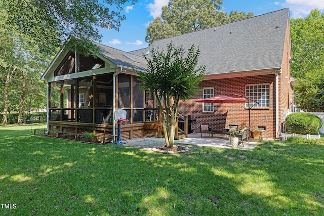 102 Sevendales Dr, Goldsboro, NC 27534 - rear view of property featuring a patio, a sunroom, a yard, brick siding, and a shingled roof