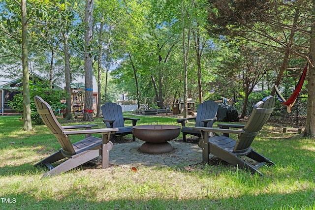 102 Sevendales Dr, Goldsboro, NC 27534 - view of grassy yard featuring a fire pit