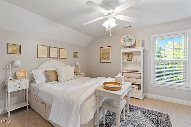 102 Sevendales Dr, Goldsboro, NC 27534 - bedroom featuring light carpet, baseboards, ceiling fan, and vaulted ceiling