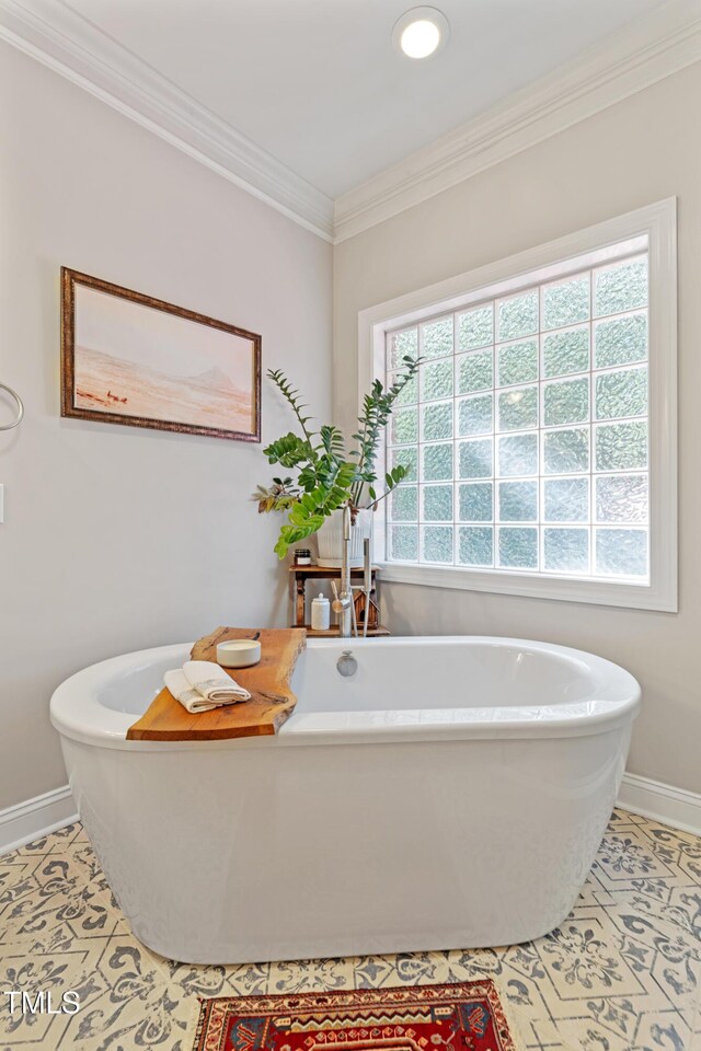 102 Sevendales Dr, Goldsboro, NC 27534 - full bath with a soaking tub, baseboards, ornamental molding, tile patterned floors, and recessed lighting