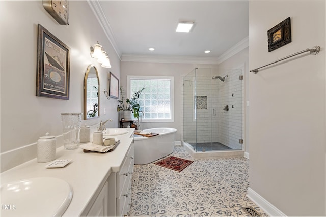 102 Sevendales Dr, Goldsboro, NC 27534 - full bathroom featuring double vanity, a shower stall, a freestanding bath, recessed lighting, and ornamental molding