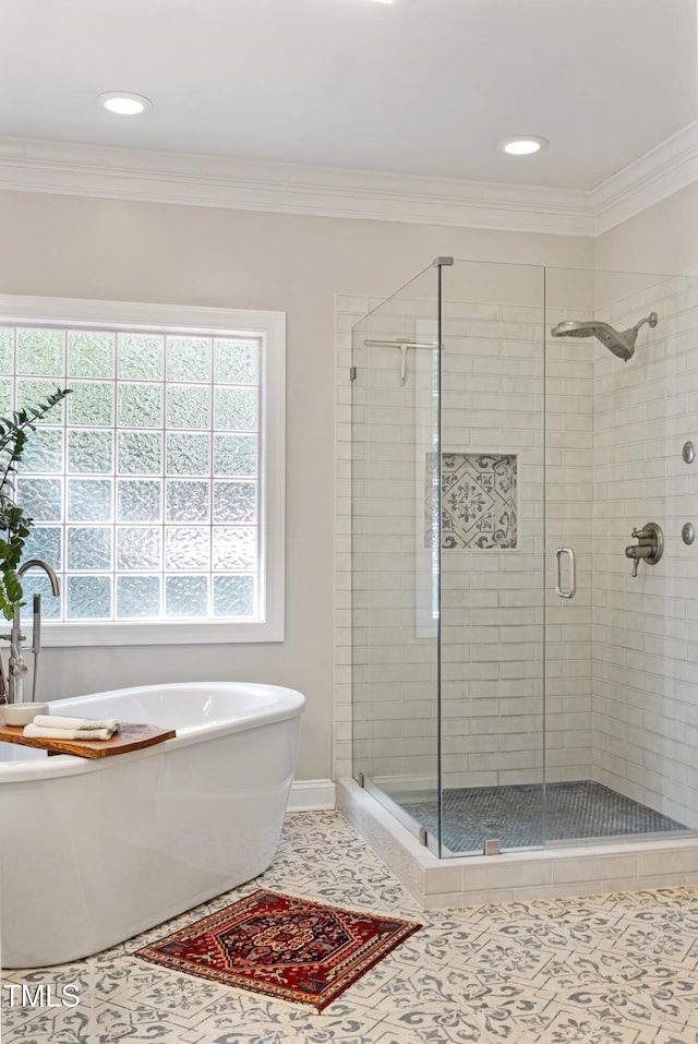 102 Sevendales Dr, Goldsboro, NC 27534 - full bathroom featuring a freestanding tub, a shower stall, ornamental molding, baseboards, and recessed lighting