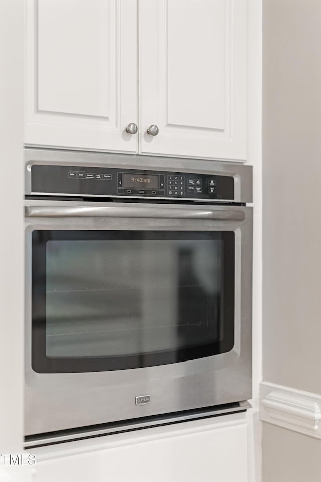 102 Sevendales Dr, Goldsboro, NC 27534 - kitchen view of white cabinets and oven