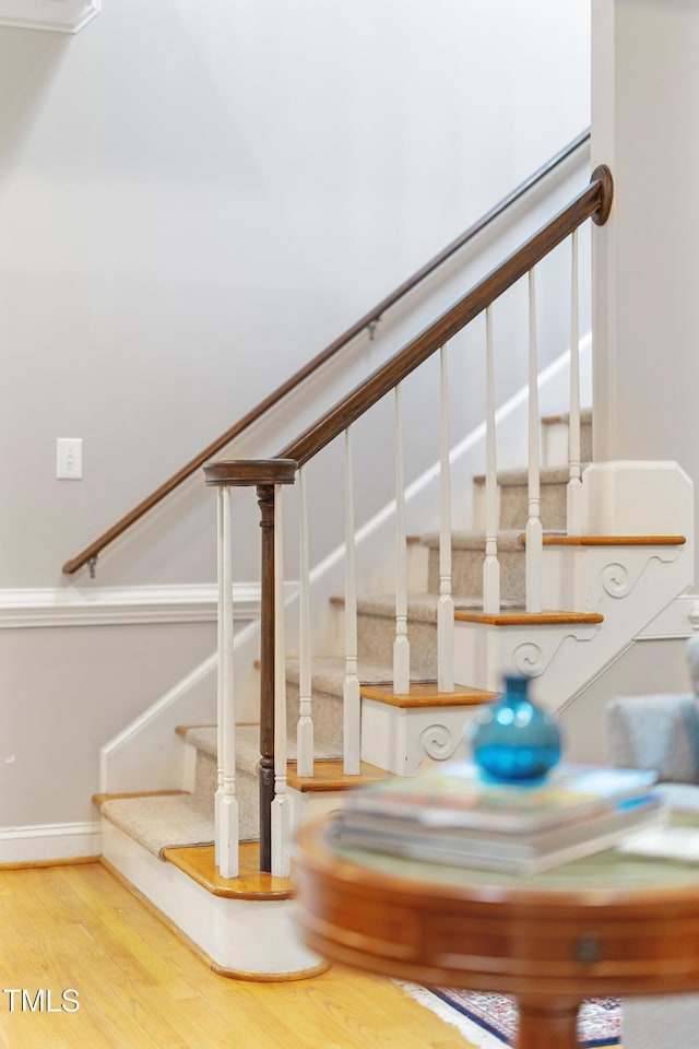 102 Sevendales Dr, Goldsboro, NC 27534 - stairway with wood finished floors and baseboards