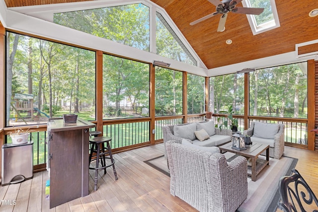 102 Sevendales Dr, Goldsboro, NC 27534 - sunroom with an outdoor living space, ceiling fan, lofted ceiling, a skylight, and view of scattered trees