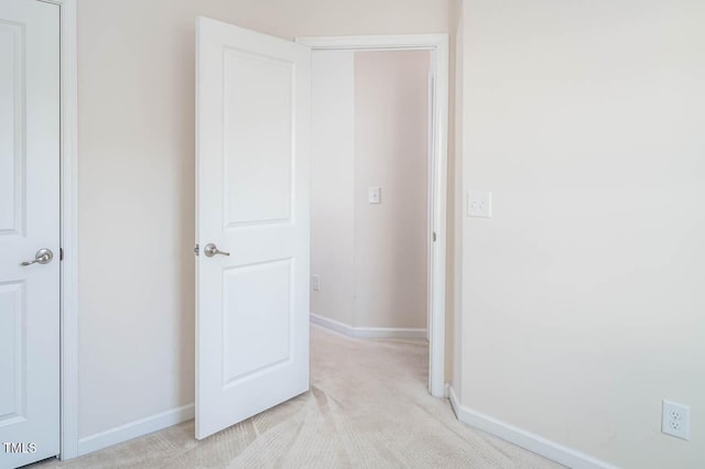 732 Suffield Way, Cary, NC 27519 - unfurnished bedroom with light carpet and baseboards