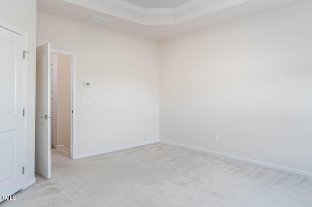 732 Suffield Way, Cary, NC 27519 - unfurnished room featuring light colored carpet, crown molding, and a tray ceiling