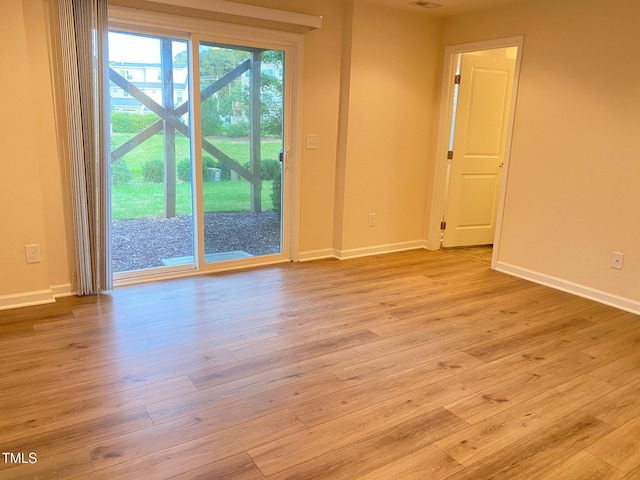 732 Suffield Way, Cary, NC 27519 - spare room with wood finished floors