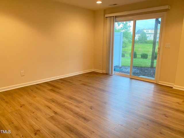 732 Suffield Way, Cary, NC 27519 - unfurnished room featuring wood finished floors and recessed lighting
