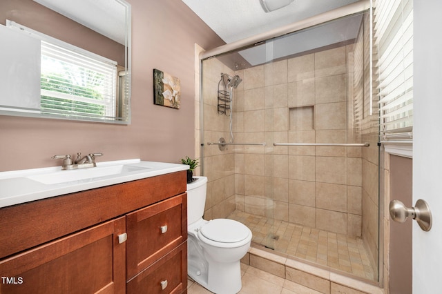 202 Howland Ave, Cary, NC 27513 - bathroom featuring a shower stall, vanity, and tile patterned floors