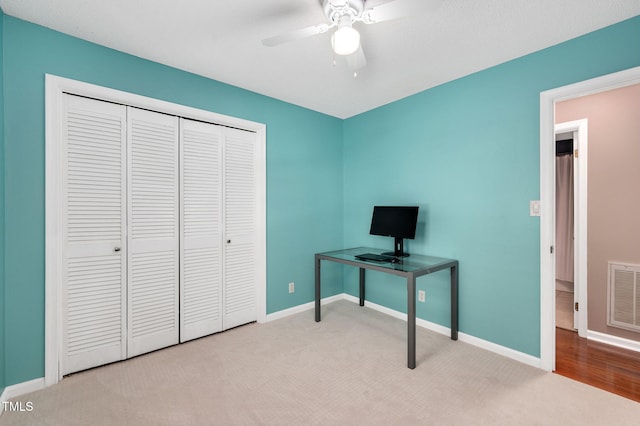 202 Howland Ave, Cary, NC 27513 - bedroom featuring carpet, a closet, a ceiling fan, and a desk