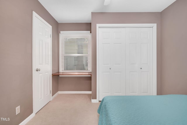 202 Howland Ave, Cary, NC 27513 - bedroom featuring carpet flooring, ceiling fan, and a closet