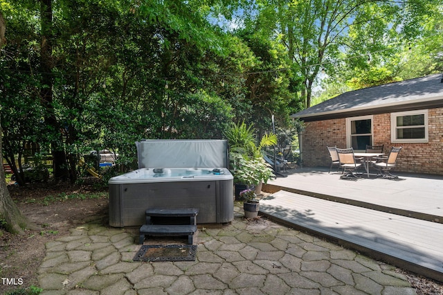 202 Howland Ave, Cary, NC 27513 - view of patio / terrace featuring a hot tub, outdoor dining area, and a deck