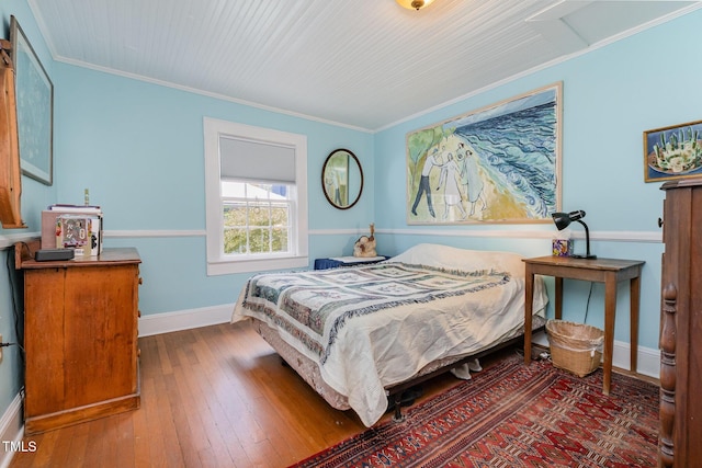 108 High St, Carrboro, NC 27510 - bedroom with wood-type flooring and crown molding