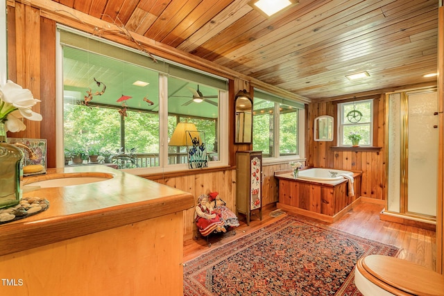 108 High St, Carrboro, NC 27510 - full bathroom with hardwood / wood-style flooring, a shower stall, a garden tub, wood ceiling, and wooden walls