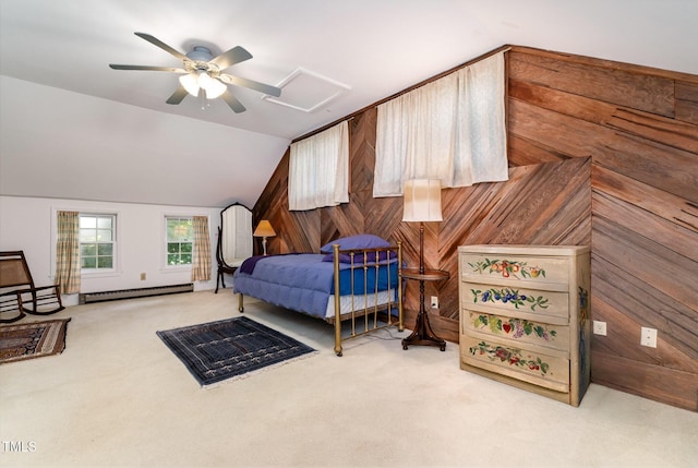 108 High St, Carrboro, NC 27510 - carpeted bedroom featuring baseboard heating, vaulted ceiling, wooden walls, and a ceiling fan
