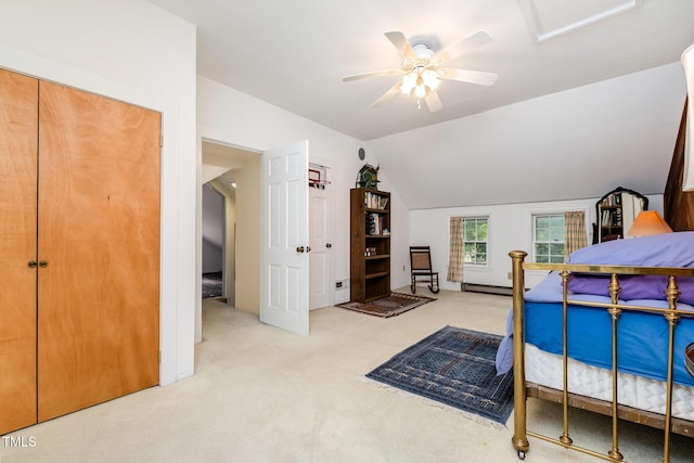 108 High St, Carrboro, NC 27510 - carpeted bedroom with vaulted ceiling, a baseboard radiator, and ceiling fan