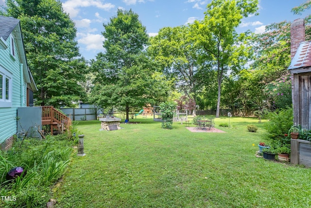 108 High St, Carrboro, NC 27510 - fenced backyard with a playground and a patio