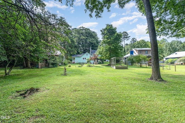 108 High St, Carrboro, NC 27510 - view of yard featuring view of wooded area