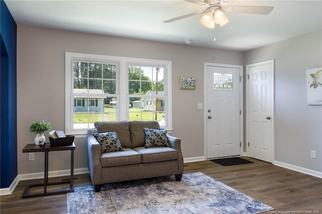 108 Pine St, Dunn, NC 28334 - entryway featuring baseboards, wood finished floors, and a ceiling fan