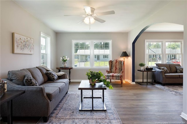 108 Pine St, Dunn, NC 28334 - living area with arched walkways, healthy amount of natural light, and wood finished floors