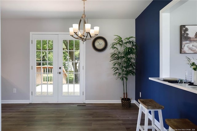 108 Pine St, Dunn, NC 28334 - entryway featuring a chandelier, dark wood-style flooring, baseboards, and french doors