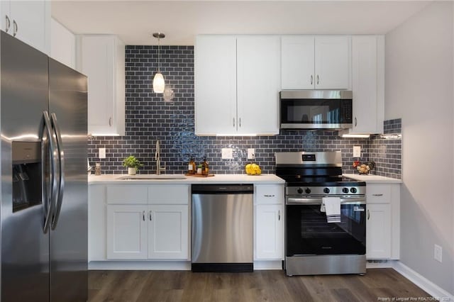 108 Pine St, Dunn, NC 28334 - kitchen with appliances with stainless steel finishes, a sink, and light countertops