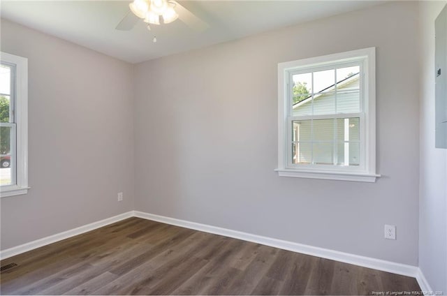 108 Pine St, Dunn, NC 28334 - empty room featuring healthy amount of natural light, a ceiling fan, and baseboards