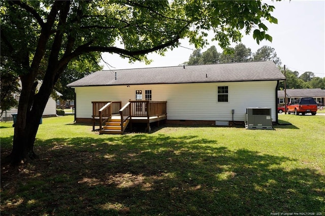 108 Pine St, Dunn, NC 28334 - rear view of house with crawl space, central air condition unit, a wooden deck, and a lawn