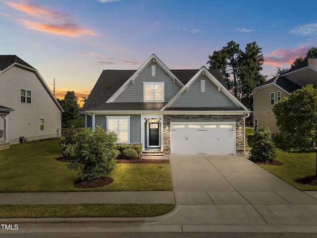 427 Cedar Pond Ct, Knightdale, NC 27545 - craftsman-style house with a yard, concrete driveway, and an attached garage