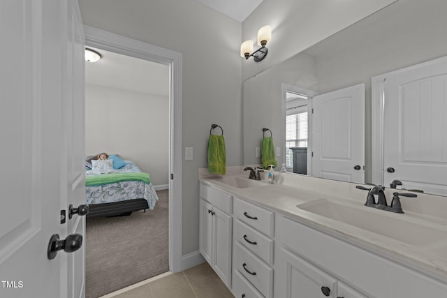 427 Cedar Pond Ct, Knightdale, NC 27545 - ensuite bathroom featuring double vanity and tile patterned flooring