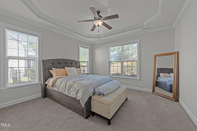 427 Cedar Pond Ct, Knightdale, NC 27545 - bedroom with a tray ceiling, light colored carpet, ornamental molding, and a ceiling fan