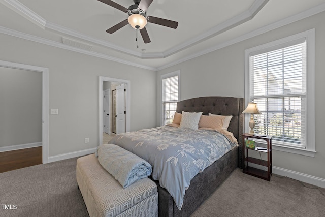 427 Cedar Pond Ct, Knightdale, NC 27545 - bedroom featuring carpet, crown molding, a tray ceiling, and a ceiling fan