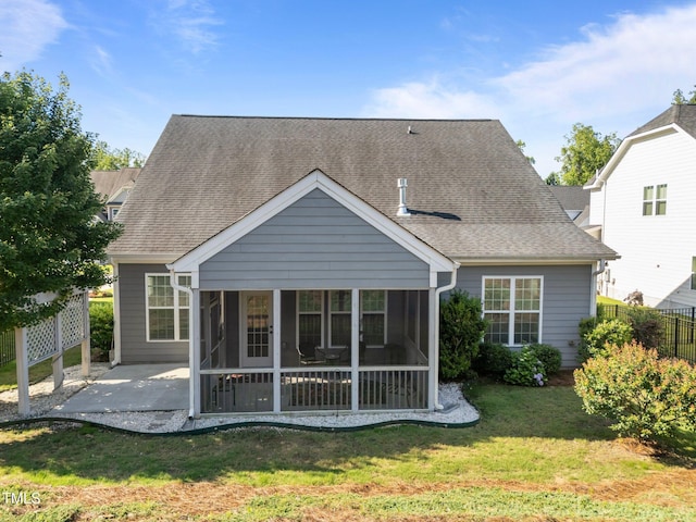 427 Cedar Pond Ct, Knightdale, NC 27545 - rear view of property with a sunroom, a patio area, and a shingled roof