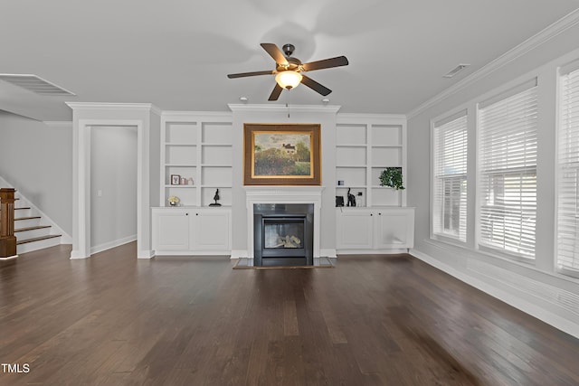 427 Cedar Pond Ct, Knightdale, NC 27545 - unfurnished living room with a fireplace with flush hearth, ceiling fan, built in features, stairs, and crown molding