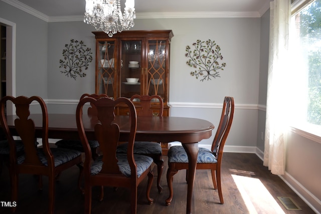 408 Greenfern Ct, Burlington, NC 27215 - dining space featuring dark wood-style flooring, a chandelier, and ornamental molding
