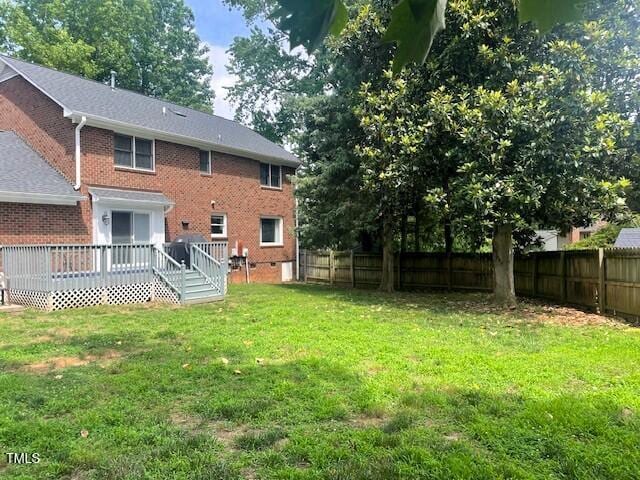 408 Greenfern Ct, Burlington, NC 27215 - fenced backyard with a deck
