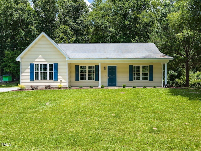381 Gray Ghost Ln, Benson, NC 27504 - ranch-style home featuring a porch and a front yard