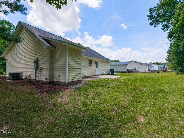 381 Gray Ghost Ln, Benson, NC 27504 - back of house with a patio area and a yard