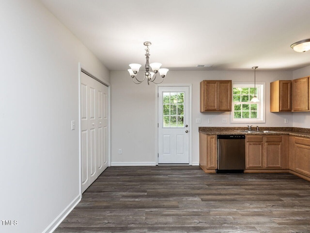 381 Gray Ghost Ln, Benson, NC 27504 - kitchen featuring stainless steel dishwasher, dark countertops, a chandelier, and dark wood-style flooring