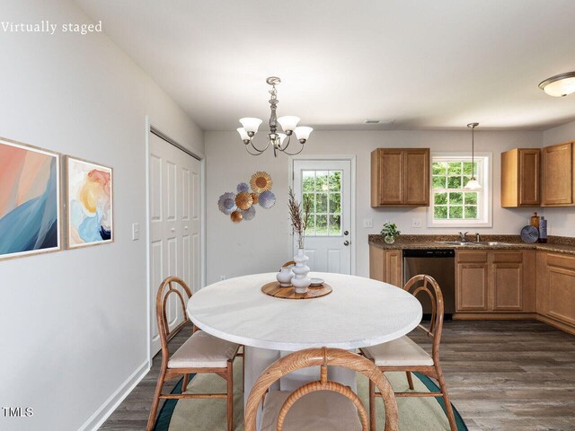 381 Gray Ghost Ln, Benson, NC 27504 - dining space featuring dark wood-style flooring and a chandelier