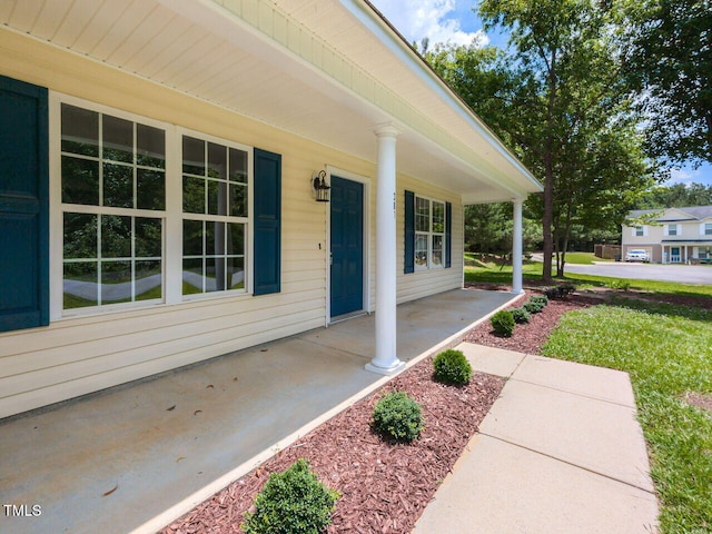381 Gray Ghost Ln, Benson, NC 27504 - doorway to property with covered porch