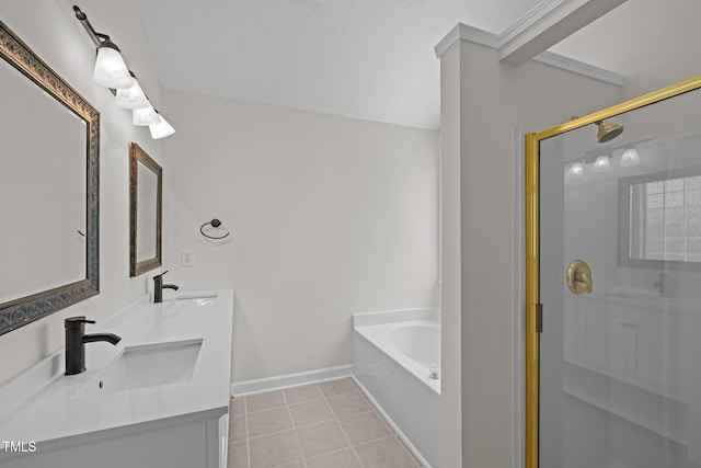 103 Burham Ct, Apex, NC 27502 - full bath with a stall shower, a bath, double vanity, tile patterned flooring, and baseboards