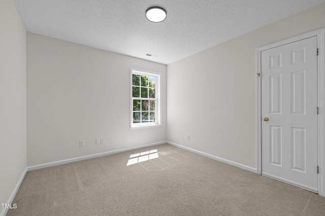 103 Burham Ct, Apex, NC 27502 - carpeted empty room with a textured ceiling and baseboards