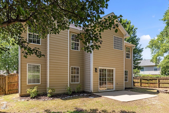 103 Burham Ct, Apex, NC 27502 - back of house featuring a patio area