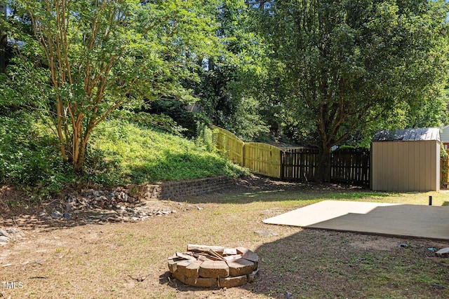 103 Burham Ct, Apex, NC 27502 - view of yard with a patio area, a shed, and a fire pit