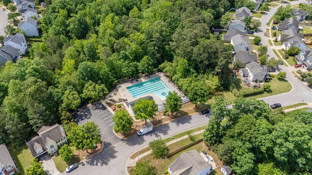 1148 Dexter Ridge Dr, Holly Springs, NC 27540 - aerial perspective of suburban area featuring a pool